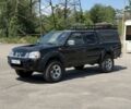 Черный Ниссан Навара, объемом двигателя 2.5 л и пробегом 250 тыс. км за 4800 $, фото 1 на Automoto.ua