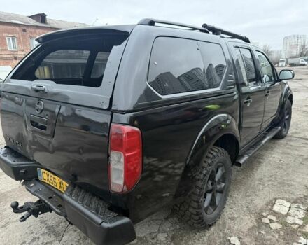 Черный Ниссан Навара, объемом двигателя 2.5 л и пробегом 210 тыс. км за 4000 $, фото 4 на Automoto.ua