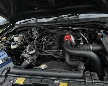 Черный Ниссан Навара, объемом двигателя 2.5 л и пробегом 210 тыс. км за 4000 $, фото 9 на Automoto.ua