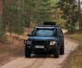 Черный Ниссан Навара, объемом двигателя 2.49 л и пробегом 220 тыс. км за 11200 $, фото 1 на Automoto.ua