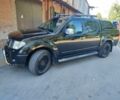 Черный Ниссан Навара, объемом двигателя 2.5 л и пробегом 240 тыс. км за 7521 $, фото 1 на Automoto.ua