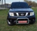 Черный Ниссан Навара, объемом двигателя 2.5 л и пробегом 210 тыс. км за 6223 $, фото 1 на Automoto.ua