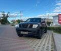 Черный Ниссан Навара, объемом двигателя 2.5 л и пробегом 250 тыс. км за 8299 $, фото 1 на Automoto.ua