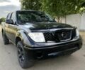 Черный Ниссан Навара, объемом двигателя 2.5 л и пробегом 250 тыс. км за 3999 $, фото 1 на Automoto.ua