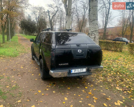 Черный Ниссан Навара, объемом двигателя 2.5 л и пробегом 260 тыс. км за 9500 $, фото 2 на Automoto.ua