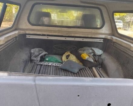 Черный Ниссан Навара, объемом двигателя 2.5 л и пробегом 125 тыс. км за 5100 $, фото 8 на Automoto.ua