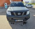 Черный Ниссан Навара, объемом двигателя 2.5 л и пробегом 390 тыс. км за 9800 $, фото 1 на Automoto.ua