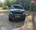 Черный Ниссан Навара, объемом двигателя 2.5 л и пробегом 335 тыс. км за 11000 $, фото 4 на Automoto.ua
