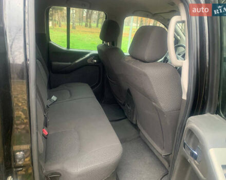 Черный Ниссан Навара, объемом двигателя 2.5 л и пробегом 260 тыс. км за 9500 $, фото 6 на Automoto.ua