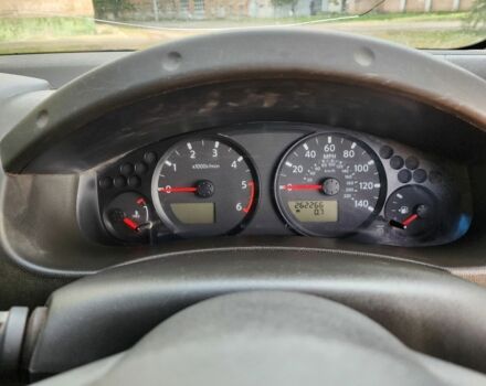 Черный Ниссан Навара, объемом двигателя 2.5 л и пробегом 260 тыс. км за 4200 $, фото 11 на Automoto.ua