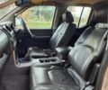 Черный Ниссан Навара, объемом двигателя 2.5 л и пробегом 260 тыс. км за 4200 $, фото 9 на Automoto.ua