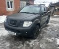 Черный Ниссан Навара, объемом двигателя 2.5 л и пробегом 230 тыс. км за 4400 $, фото 1 на Automoto.ua
