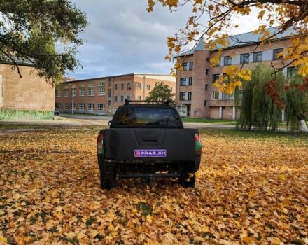 Черный Ниссан Навара, объемом двигателя 2.5 л и пробегом 260 тыс. км за 4200 $, фото 3 на Automoto.ua