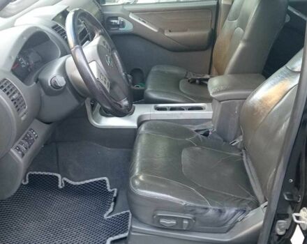 Черный Ниссан Навара, объемом двигателя 2.5 л и пробегом 256 тыс. км за 7850 $, фото 1 на Automoto.ua