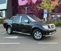 Черный Ниссан Навара, объемом двигателя 2.49 л и пробегом 450 тыс. км за 11990 $, фото 1 на Automoto.ua