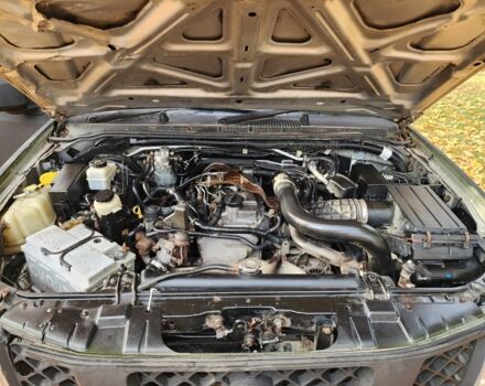 Черный Ниссан Навара, объемом двигателя 2.5 л и пробегом 260 тыс. км за 4200 $, фото 12 на Automoto.ua