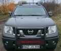 Черный Ниссан Навара, объемом двигателя 2.5 л и пробегом 240 тыс. км за 8600 $, фото 1 на Automoto.ua