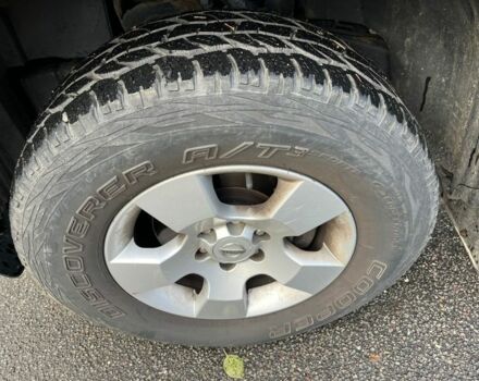 Черный Ниссан Навара, объемом двигателя 2.5 л и пробегом 218 тыс. км за 8099 $, фото 7 на Automoto.ua