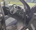 Черный Ниссан Навара, объемом двигателя 2.5 л и пробегом 350 тыс. км за 5600 $, фото 2 на Automoto.ua