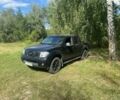 Черный Ниссан Навара, объемом двигателя 2.5 л и пробегом 312 тыс. км за 5850 $, фото 1 на Automoto.ua