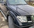Черный Ниссан Навара, объемом двигателя 2.5 л и пробегом 350 тыс. км за 5600 $, фото 1 на Automoto.ua