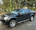 Черный Ниссан Навара, объемом двигателя 2.5 л и пробегом 218 тыс. км за 8099 $, фото 1 на Automoto.ua
