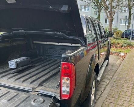 Черный Ниссан Навара, объемом двигателя 2.5 л и пробегом 218 тыс. км за 8099 $, фото 4 на Automoto.ua