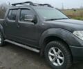 Черный Ниссан Навара, объемом двигателя 2.5 л и пробегом 240 тыс. км за 8600 $, фото 1 на Automoto.ua