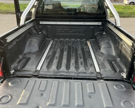 Черный Ниссан Навара, объемом двигателя 2.5 л и пробегом 177 тыс. км за 8900 $, фото 10 на Automoto.ua