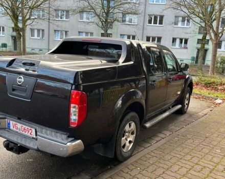 Черный Ниссан Навара, объемом двигателя 2.5 л и пробегом 218 тыс. км за 8099 $, фото 2 на Automoto.ua