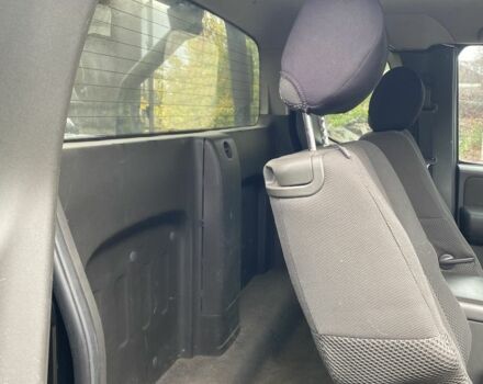 Черный Ниссан Навара, объемом двигателя 2.5 л и пробегом 314 тыс. км за 4950 $, фото 7 на Automoto.ua