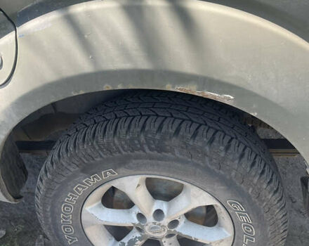 Черный Ниссан Навара, объемом двигателя 2.49 л и пробегом 429 тыс. км за 10700 $, фото 4 на Automoto.ua