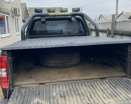 Черный Ниссан Навара, объемом двигателя 2.5 л и пробегом 314 тыс. км за 4950 $, фото 8 на Automoto.ua