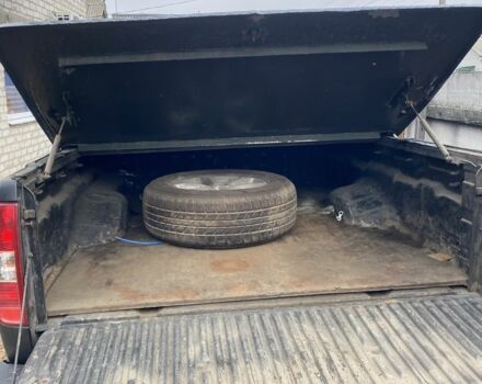 Черный Ниссан Навара, объемом двигателя 2.5 л и пробегом 314 тыс. км за 4950 $, фото 9 на Automoto.ua