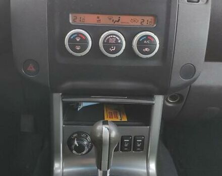 Черный Ниссан Навара, объемом двигателя 2.5 л и пробегом 320 тыс. км за 17300 $, фото 7 на Automoto.ua