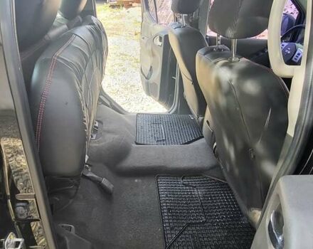 Черный Ниссан Навара, объемом двигателя 2.49 л и пробегом 170 тыс. км за 13800 $, фото 6 на Automoto.ua