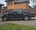 Черный Ниссан Навара, объемом двигателя 2.49 л и пробегом 150 тыс. км за 12500 $, фото 1 на Automoto.ua