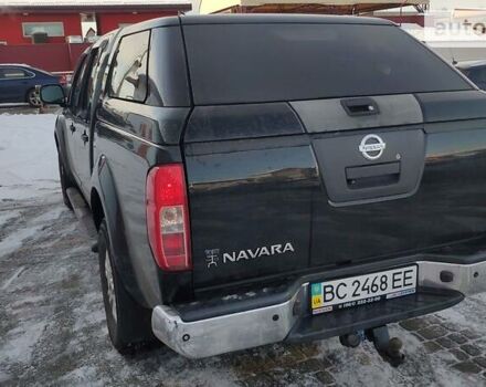 Черный Ниссан Навара, объемом двигателя 2.5 л и пробегом 320 тыс. км за 17300 $, фото 1 на Automoto.ua