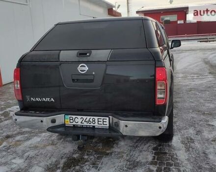 Черный Ниссан Навара, объемом двигателя 2.5 л и пробегом 320 тыс. км за 17300 $, фото 2 на Automoto.ua