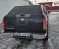 Черный Ниссан Навара, объемом двигателя 2.5 л и пробегом 320 тыс. км за 17300 $, фото 2 на Automoto.ua