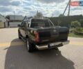 Чорний Ніссан Навара, об'ємом двигуна 2.99 л та пробігом 245 тис. км за 15400 $, фото 5 на Automoto.ua