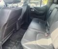 Черный Ниссан Навара, объемом двигателя 3 л и пробегом 350 тыс. км за 11001 $, фото 4 на Automoto.ua