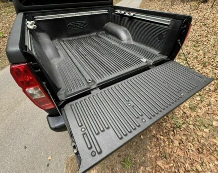 Черный Ниссан Навара, объемом двигателя 2.5 л и пробегом 339 тыс. км за 4500 $, фото 8 на Automoto.ua