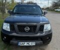 Чорний Ніссан Навара, об'ємом двигуна 2.49 л та пробігом 289 тис. км за 10000 $, фото 1 на Automoto.ua