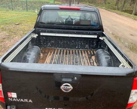 Черный Ниссан Навара, объемом двигателя 2.5 л и пробегом 165 тыс. км за 12378 $, фото 6 на Automoto.ua