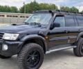 Чорний Ніссан Навара, об'ємом двигуна 3 л та пробігом 234 тис. км за 4400 $, фото 1 на Automoto.ua