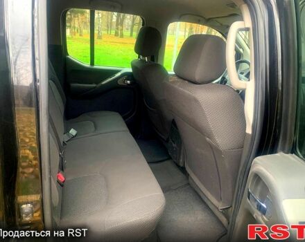 Черный Ниссан Навара, объемом двигателя 2.5 л и пробегом 260 тыс. км за 9500 $, фото 5 на Automoto.ua