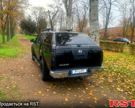 Черный Ниссан Навара, объемом двигателя 2.5 л и пробегом 260 тыс. км за 9500 $, фото 2 на Automoto.ua