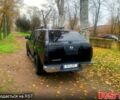 Черный Ниссан Навара, объемом двигателя 2.5 л и пробегом 260 тыс. км за 9500 $, фото 2 на Automoto.ua