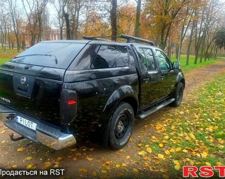 Черный Ниссан Навара, объемом двигателя 2.5 л и пробегом 260 тыс. км за 9500 $, фото 3 на Automoto.ua